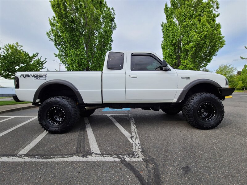 1998 Ford Ranger SUPER CAB 4X4 / V6 3.0L/ 5 SPEED / BUMPER / LIFTED  / MUD TIRES / CUSTOM WHEELS / BRUSH GUARD - Photo 4 - Portland, OR 97217