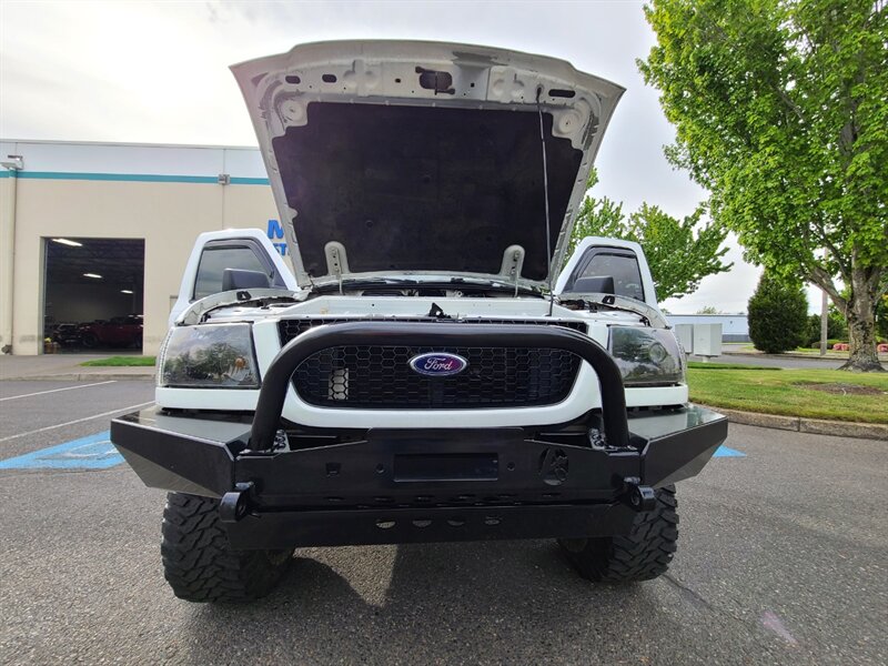 1998 Ford Ranger SUPER CAB 4X4 / V6 3.0L/ 5 SPEED / BUMPER / LIFTED  / MUD TIRES / CUSTOM WHEELS / BRUSH GUARD - Photo 29 - Portland, OR 97217