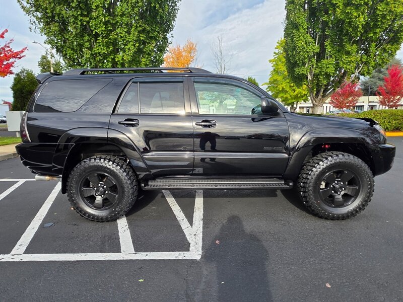 2005 Toyota 4Runner SR5 / V6 / 4X4 / DIFFERENTIAL LOCKER / LEATHER  / NEW LIFT / NEW TIRES / BLACKED OUT / SERVICE RECORDS !! - Photo 4 - Portland, OR 97217