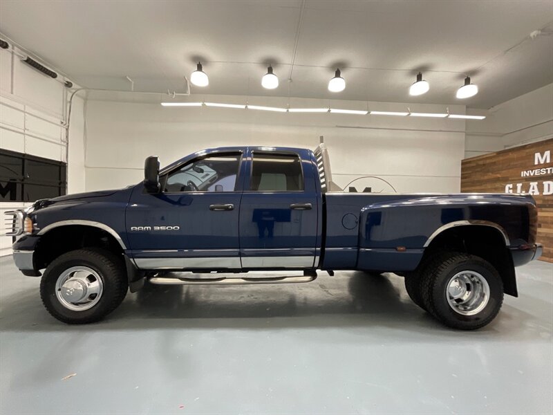 2003 Dodge Ram 3500 Laramie 4X4 / 5.9L DIESEL / DUALLY / 63K  MILES  / Leather Heated Seats / Long bed / BRAND NEW SET OF TIRES / NEVER HAD A GOOSE NECK OR A FITH WHEEL INSTALLED / AIR COMPRESSOR / ZERO RUST - Photo 3 - Gladstone, OR 97027