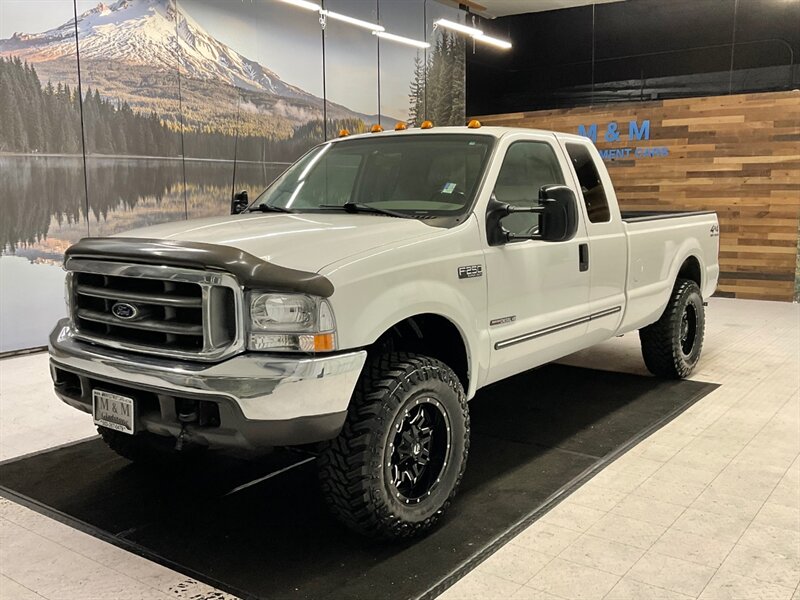 2000 Ford F-250 4dr XLT 4WD / 7.3L DIESEL / 1-OWNER / 146,000 MILE  / LEVELED w. BRAND NEW WHEELS & TIRES / LOCAL OWNER / RUST FREE / LONG BED / SHARP & CLEAN !! - Photo 1 - Gladstone, OR 97027