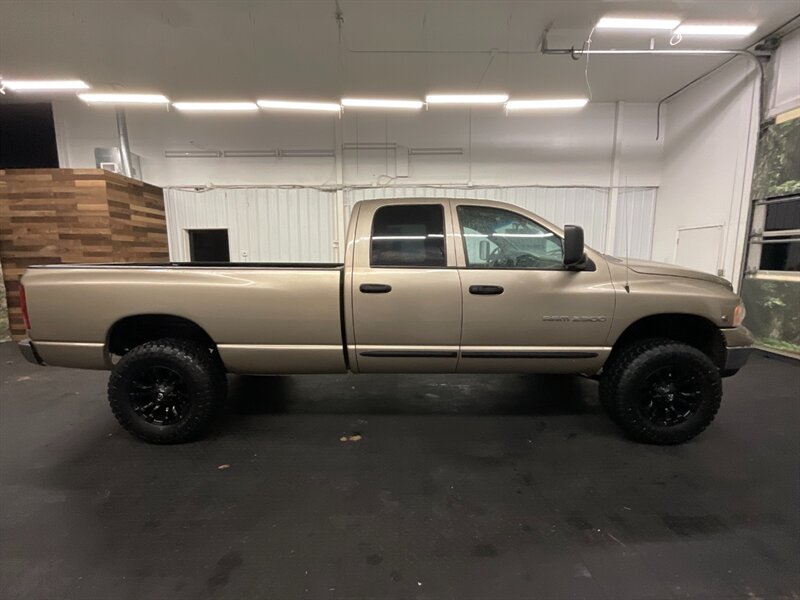 2003 Dodge Ram 2500 SLT Quad Cab 4X4 / 5.9L CUMMINS DIESEL / LIFTED  NEW LIFT w/ NEW 35 " MUD TIRES & NEW FUEL WHEELS / RUST FREE / LONG BED / SHARP & CLEAN!! - Photo 4 - Gladstone, OR 97027