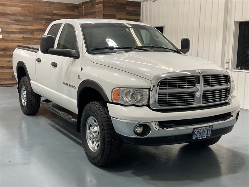 2004 Dodge Ram 2500 SLT Quad Cab 4X4 / 5.9L DIESEL / Leather Seats  / Short Bed / ZERO RUST / Spray in bed liner - Photo 2 - Gladstone, OR 97027