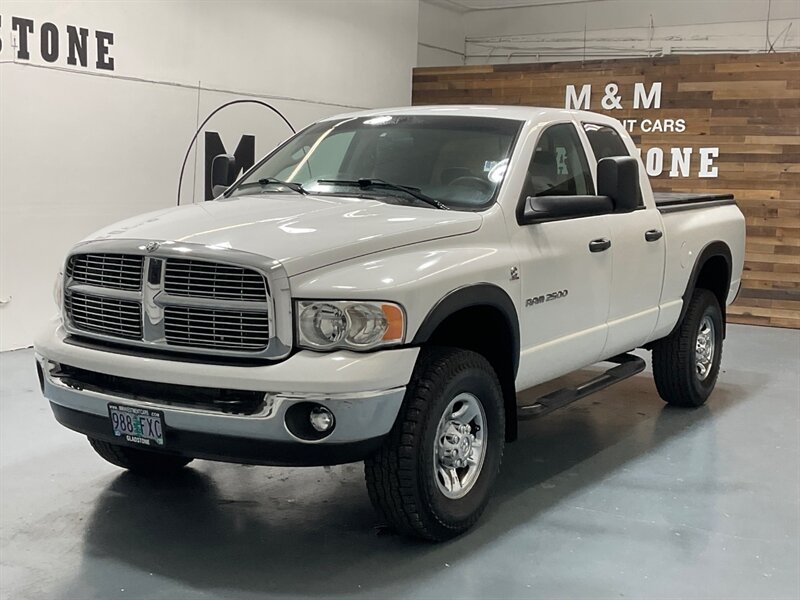 2004 Dodge Ram 2500 SLT Quad Cab 4X4 / 5.9L DIESEL / Leather Seats  / Short Bed / ZERO RUST / Spray in bed liner - Photo 1 - Gladstone, OR 97027