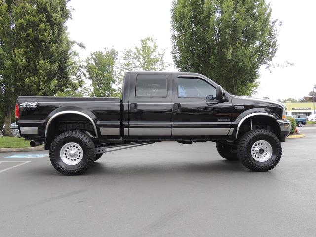 2002 Ford F-350 Super Duty Lariat / 4X4 / 7.3L DIESEL / LIFTED   - Photo 4 - Portland, OR 97217