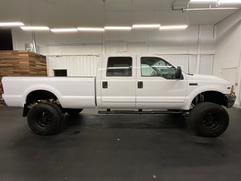 2001 Ford F-350 4dr Crew Cab 4X4 /  6.8L V10 / LIFTED w/ 37inc  1-TON / LONG BED / LIFTED w/ 37 inc TOYO OPEN COUNTRY - Photo 4 - Gladstone, OR 97027