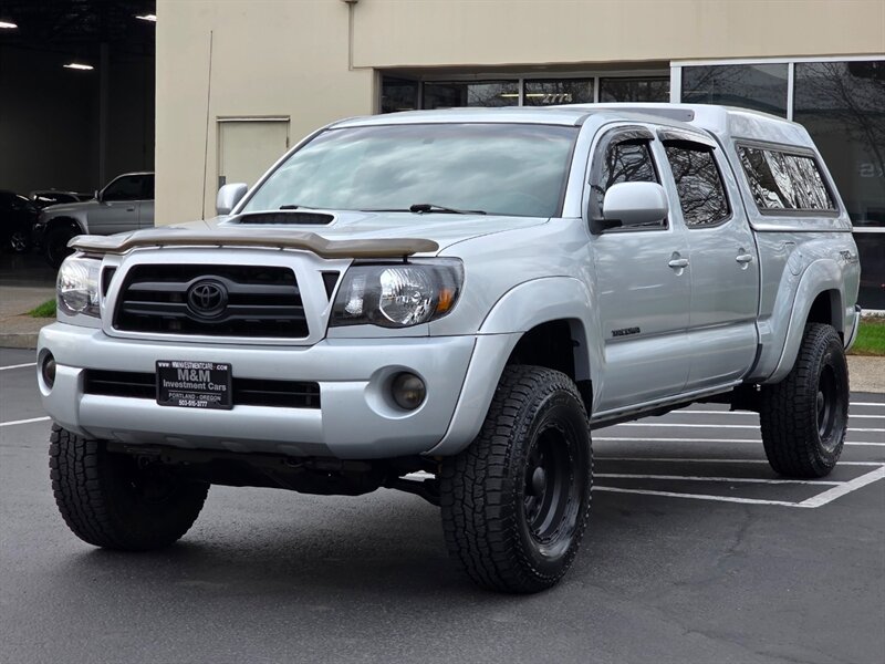 2006 Toyota Tacoma 4X4 DOUBLE CAB V6 LONG BED / DVD NAVi CAM / LIFTED  / 4.0L / HIGH ROOF TOPPER / LOCAL TRUCK / NO RUST - Photo 1 - Portland, OR 97217