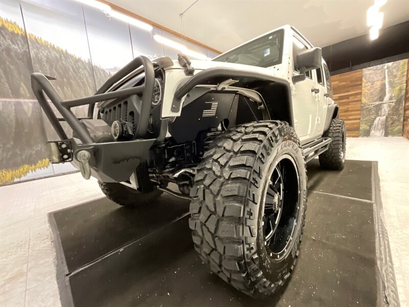 2010 Jeep Wrangler Unlimited Sport 4X4 / HARD TOP / LIFTED w. 37 " MUD  / LIFTED w. 37 " MUD TIRES & 20 " MOTO WHEELS / WINCH / CUSTOM BUMPERS / LOCAL JEEP / RUST FREE - Photo 9 - Gladstone, OR 97027