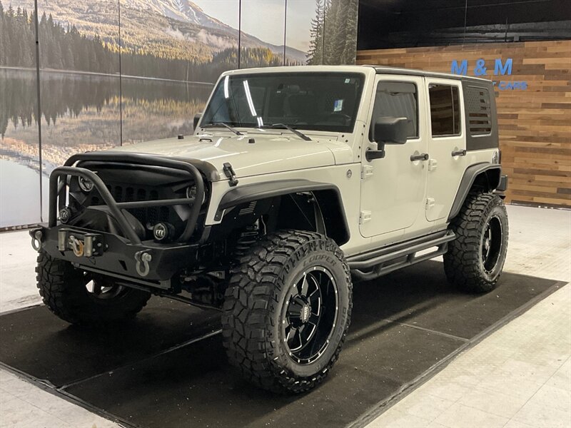 2010 Jeep Wrangler Unlimited Sport 4X4 / HARD TOP / LIFTED w. 37 " MUD  / LIFTED w. 37 " MUD TIRES & 20 " MOTO WHEELS / WINCH / CUSTOM BUMPERS / LOCAL JEEP / RUST FREE - Photo 1 - Gladstone, OR 97027