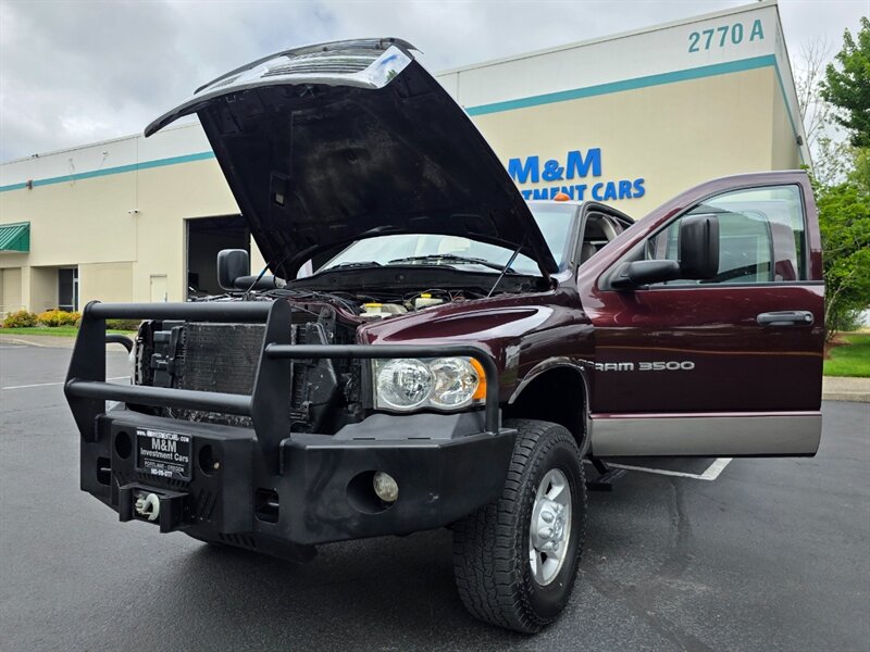 2004 Dodge Ram 3500 Flat Bed / 4X4 / 6 Speed / 5.9L CUMMINS DIESEL / Manual Transmission / Winch / High Output / Exhaust Brake / 1-TON - Photo 26 - Portland, OR 97217
