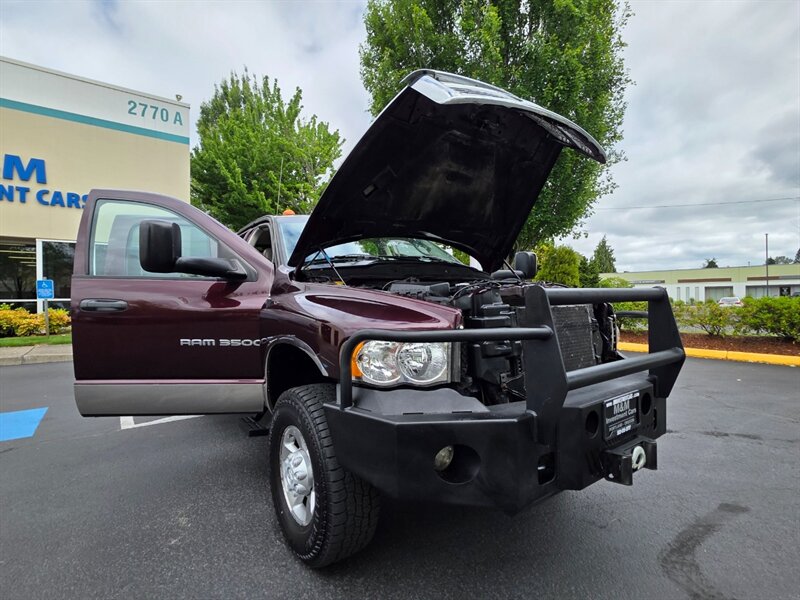 2004 Dodge Ram 3500 Flat Bed / 4X4 / 6 Speed / 5.9L CUMMINS DIESEL / Manual Transmission / Winch / High Output / Exhaust Brake / 1-TON - Photo 25 - Portland, OR 97217