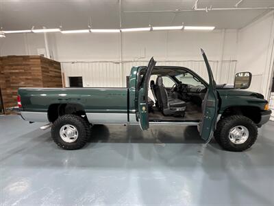 2001 Dodge Ram 2500 Laramie 4X4 6-SPEED MANUAL / 5.9L CUMMINS DIESEL  / Leather Seats / LONG BED / ZERO RUST / NEW TIRES - Photo 42 - Gladstone, OR 97027