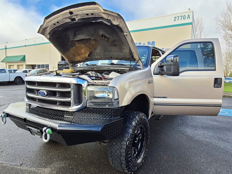 1999 Ford F-350 Super Duty / FLAT BED / Crew Cab / 4X4 / 7.3L /  Powerstroke TURBO DIESEL / 6 SPEED MANUAL / 1-TON / LIFTED - Photo 26 - Portland, OR 97217