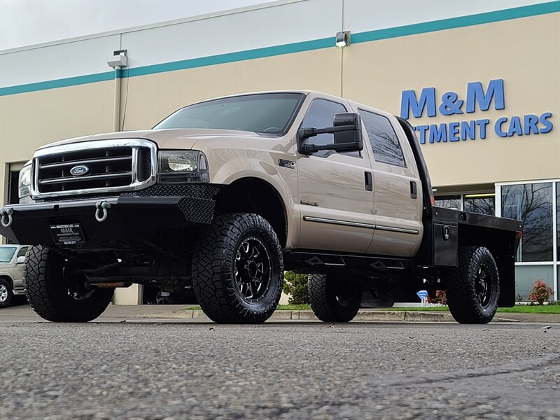 1999 Ford F-350 Super Duty / FLAT BED / Crew Cab / 4X4 / 7.3L /  Powerstroke TURBO DIESEL / 6 SPEED MANUAL / 1-TON / LIFTED - Photo 62 - Portland, OR 97217