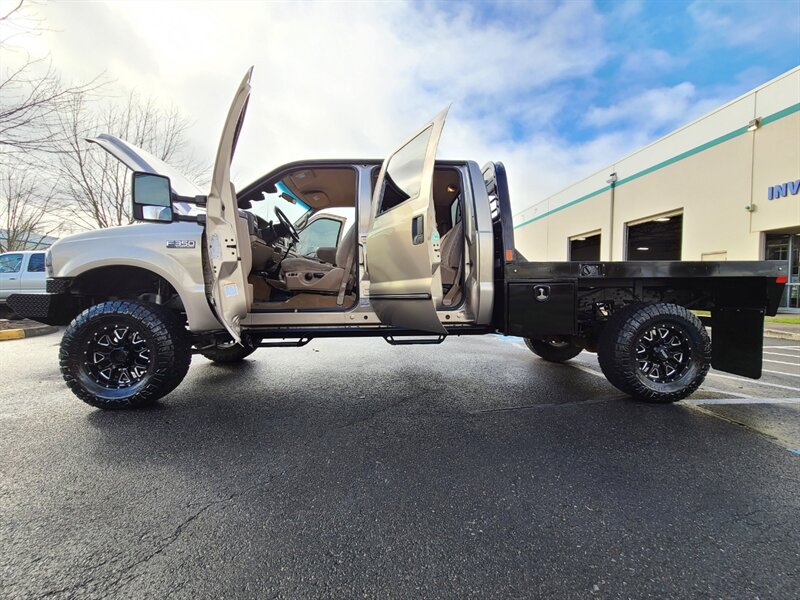 1999 Ford F-350 Super Duty / FLAT BED / Crew Cab / 4X4 / 7.3L /  Powerstroke TURBO DIESEL / 6 SPEED MANUAL / 1-TON / LIFTED - Photo 22 - Portland, OR 97217