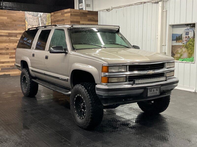 1999 Chevrolet Suburban K1500 LT 4x4 / 5.7L V8 / Leather / LIFTED LIFTED  BF GOODRICH TIRES / LOCAL SUV / RUST FREE / SHARP & CLEAN !! - Photo 2 - Gladstone, OR 97027