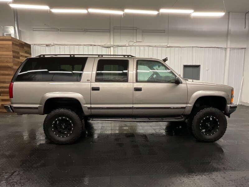 1999 Chevrolet Suburban K1500 LT 4x4 / 5.7L V8 / Leather / LIFTED LIFTED  BF GOODRICH TIRES / LOCAL SUV / RUST FREE / SHARP & CLEAN !! - Photo 4 - Gladstone, OR 97027