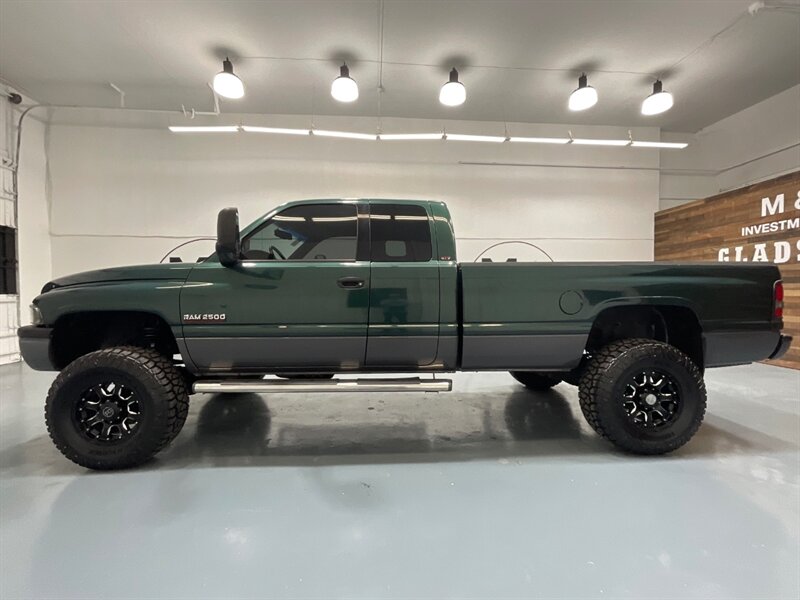 2001 Dodge Ram 2500 SLT Laramie Quad Cab 4X4 / 5.9L DIESEL / 6-SPEED  / Manual / Long bed / ZERO RUST / LIFTED w. NEW WHEELS & TIRES - Photo 3 - Gladstone, OR 97027