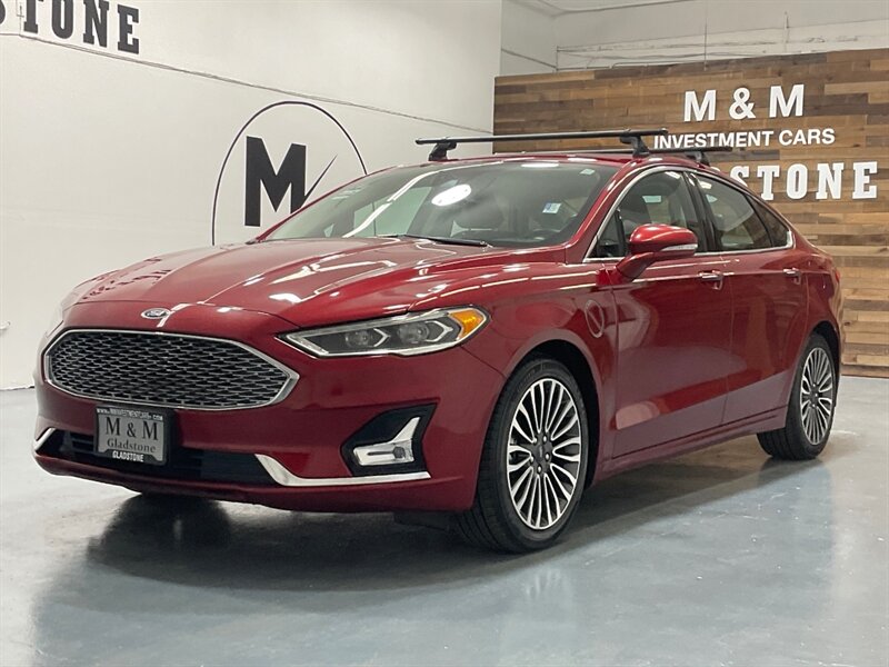 2019 Ford Fusion Energi Titanium Plug-in Hybrid / 1-OWNER / FULLY LOADED / Heated & Cooled leather seats / Sunroof / Navi / BLIS - Photo 1 - Gladstone, OR 97027
