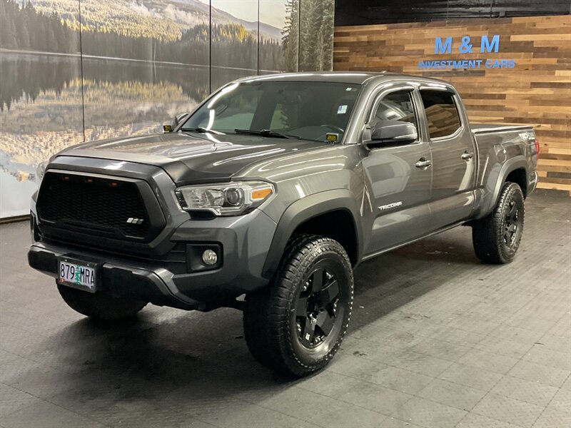 2017 Toyota Tacoma TRD Off-Road 4X4 / V6 / LONG BED / Tech Pkg/LIFTED  Navigation & Backup Camera / LIFTED w/ 33 " A/T TIRES & 17 " XD WHEELS / LOCAL TRUCK / RUST FREE / LONG BED - Photo 1 - Gladstone, OR 97027