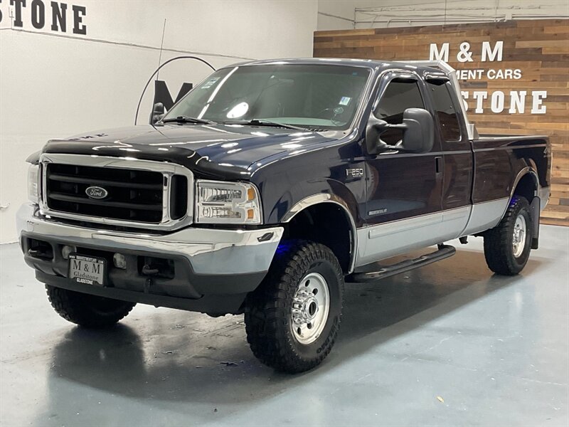 2001 Ford F-250 XLT Super Cab 4X4 / 7.3L DIESEL / 6-SPEED MANUAL / LONG BED / BRAND NEW TIRES / LOCAL TRUCK w. ZERO RUST - Photo 59 - Gladstone, OR 97027