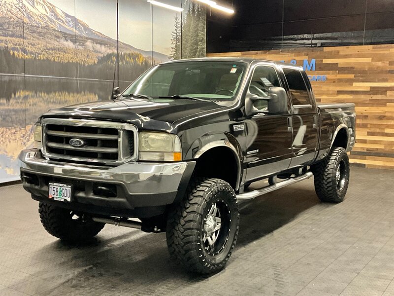 2002 Ford F-250 XLT 4X4 / 7.3L DIESEL / LIFTED w/ 37 " TOYO MUD   - Photo 1 - Gladstone, OR 97027