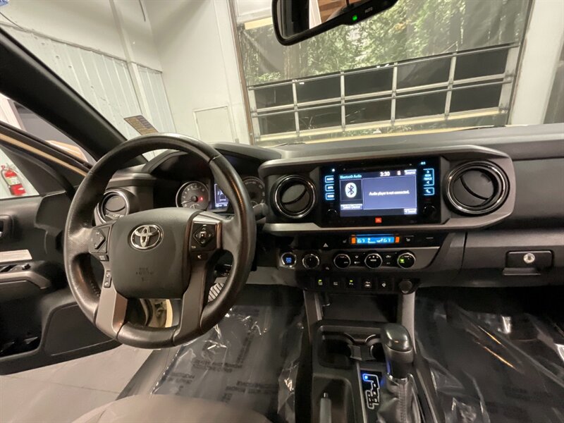 2017 Toyota Tacoma 4x4 TRD Off-Road / Technology Pkg / LIFTED LIFTED  /ARB BUMPER / Sunroof / Navigation & Backup Camera / CRAWL CONTROL / Sunroof / NEW LIFT KIT w/ NEW 35 " MUD TIRES & NEW FUEL WHEELS / SHARP & CLEAN !! - Photo 16 - Gladstone, OR 97027