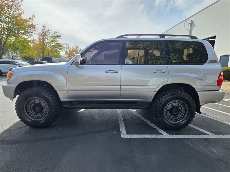 1999 Toyota Land Cruiser / 4X4 / DUAL DIFFERENTIAL LOCKER / TIMING BELT DONE / BRAND NEW OLD MAN EMU LIFT / BRAND NEW WHEELS AND TIRES / FULLY LOADED / ZERO RUST - Photo 3 - Portland, OR 97217