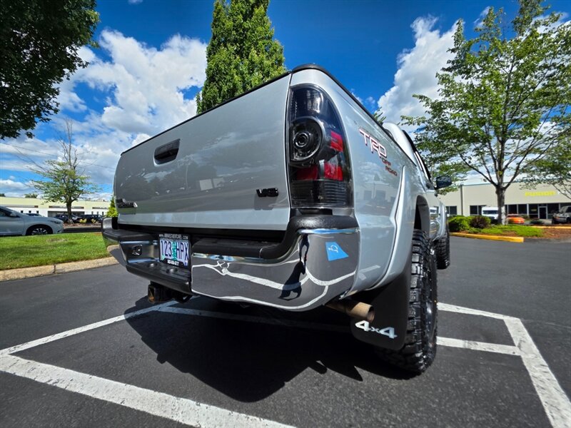 2011 Toyota Tacoma DOUBLE CAB 4X4 TRD OFF ROAD V6 DIFF LOCK / 6 SPEED MANUAL / LIFTED / BILSTIEN SUSPENSION LIFT / SPC CONTROL ARMS / 133 K MILES - Photo 12 - Portland, OR 97217