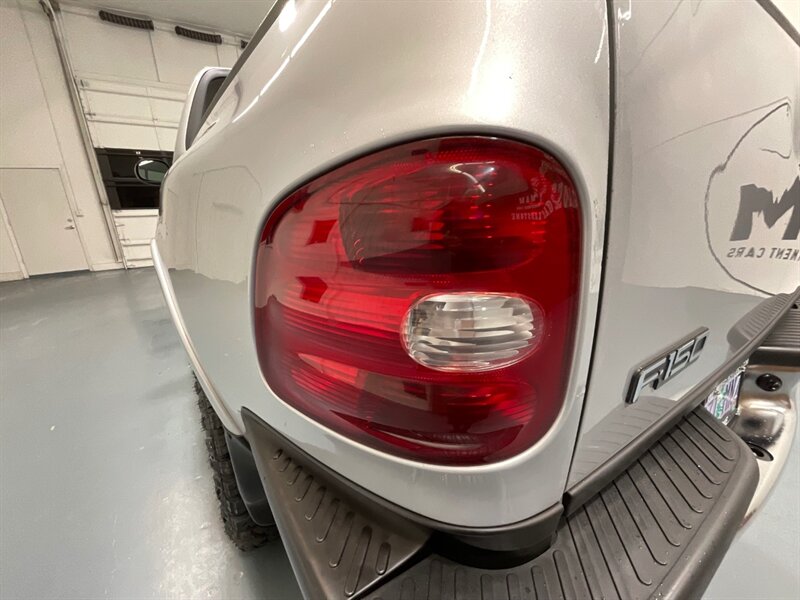 1997 Ford F-150 XLT Regular Cab 4X4 / 4.6L V8 / 5-SPEED MANUAL / LIFTED w. BRAND NEW TIRES / ZERO RUST - Photo 28 - Gladstone, OR 97027