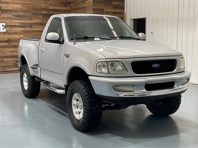 1997 Ford F-150 XLT Regular Cab 4X4 / 4.6L V8 / 5-SPEED MANUAL / LIFTED w. BRAND NEW TIRES / ZERO RUST - Photo 2 - Gladstone, OR 97027