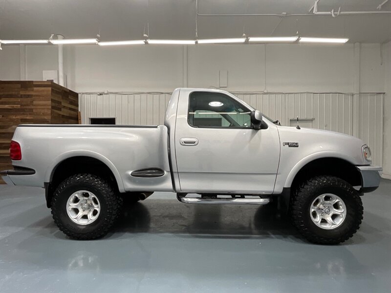 1997 Ford F-150 XLT Regular Cab 4X4 / 4.6L V8 / 5-SPEED MANUAL / LIFTED w. BRAND NEW TIRES / ZERO RUST - Photo 4 - Gladstone, OR 97027