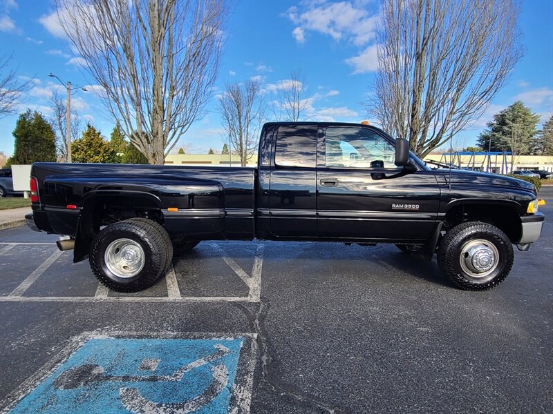 1998 Dodge Ram 3500 Laramie SLT 12-Valve / Dually / 4X4 / 5 - Speed  / GEAR VENDORS SPLITTER / Long Bed / 5.9 L Cummins Diesel / 1-Ton / Exhaust Brake / Leather - Photo 4 - Portland, OR 97217