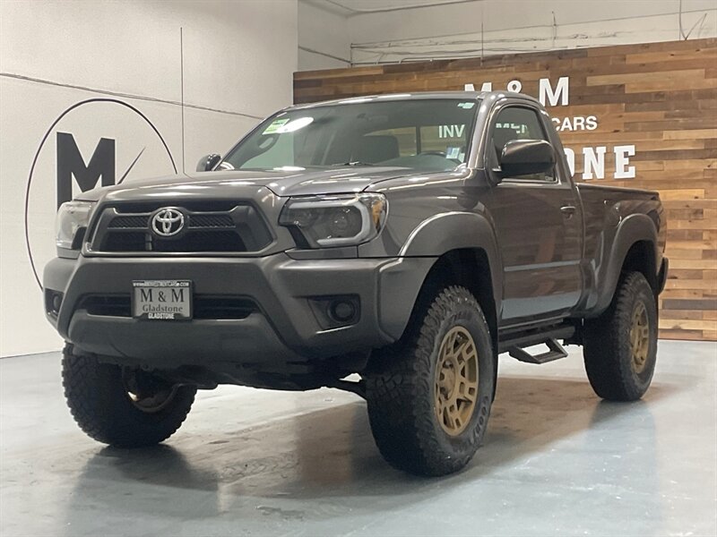 2014 Toyota Tacoma Regular Cab 4X4 / 2.7L 4Cyl / 5-SPEED MANUAL  / LIFTED w. BRAND NEW WHEELS & TIRES / ZERO RUST - Photo 1 - Gladstone, OR 97027