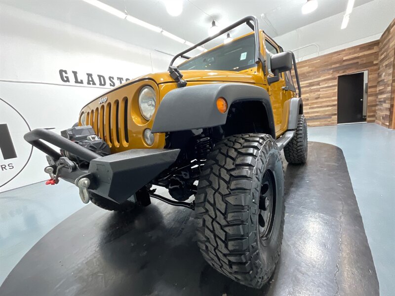 2014 Jeep Wrangler Sport 4X4 / 6-SPEED MANUAL / LIFTED / 77K MILES  / BRAND NEW TIRES - Photo 30 - Gladstone, OR 97027