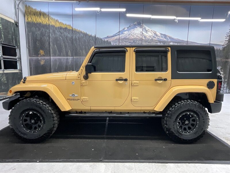 2014 Jeep Wrangler Unlimited Freedom Edition 4X4 / 3.6L V6 / LIFTED  / HARD TOP / LIFTED w. 35 " MUD TIRES & 16 " BLACK WHEELS - Photo 3 - Gladstone, OR 97027