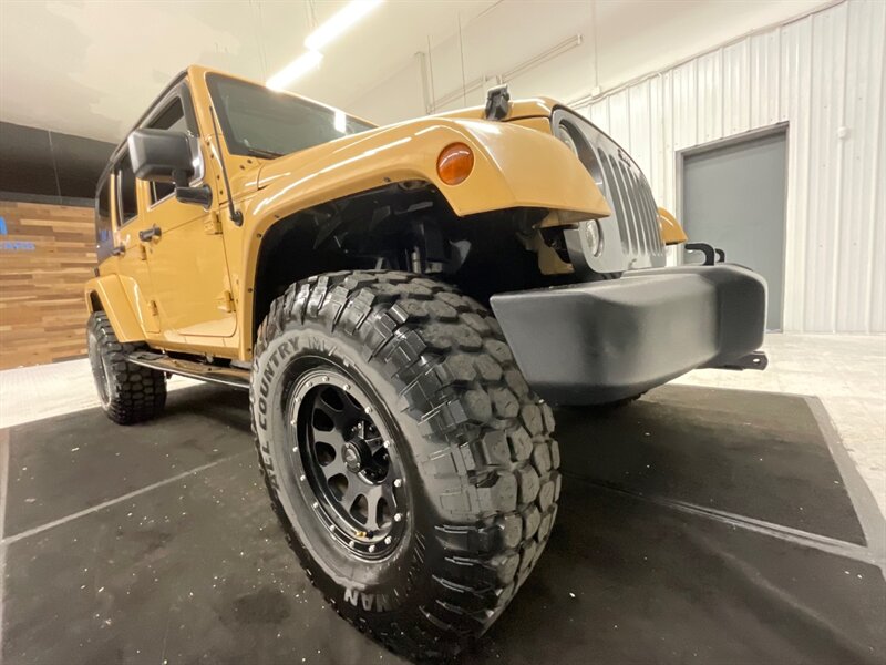 2014 Jeep Wrangler Unlimited Freedom Edition 4X4 / 3.6L V6 / LIFTED  / HARD TOP / LIFTED w. 35 " MUD TIRES & 16 " BLACK WHEELS - Photo 9 - Gladstone, OR 97027