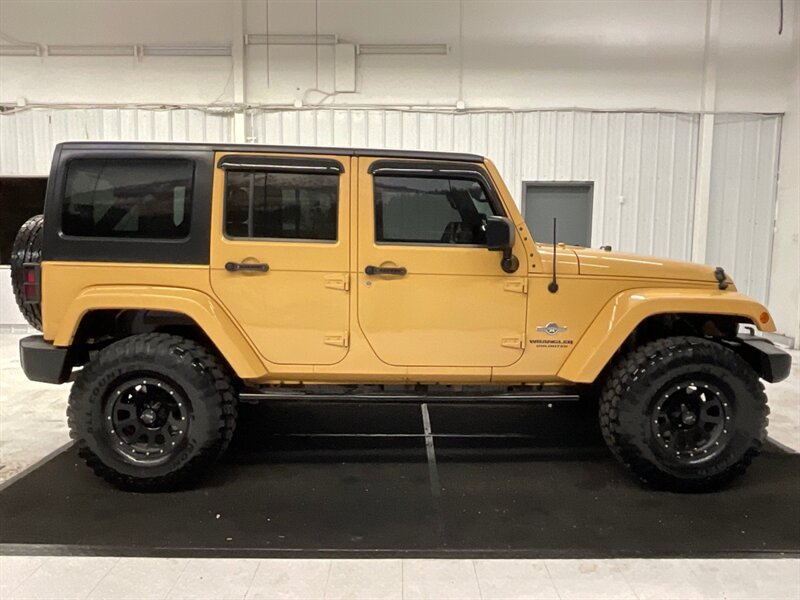 2014 Jeep Wrangler Unlimited Freedom Edition 4X4 / 3.6L V6 / LIFTED  / HARD TOP / LIFTED w. 35 " MUD TIRES & 16 " BLACK WHEELS - Photo 4 - Gladstone, OR 97027