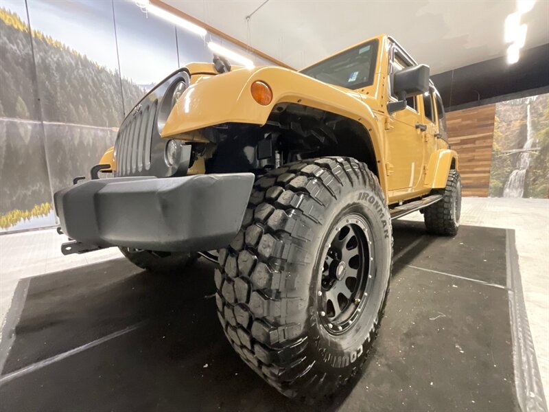 2014 Jeep Wrangler Unlimited Freedom Edition 4X4 / 3.6L V6 / LIFTED  / HARD TOP / LIFTED w. 35 " MUD TIRES & 16 " BLACK WHEELS - Photo 27 - Gladstone, OR 97027