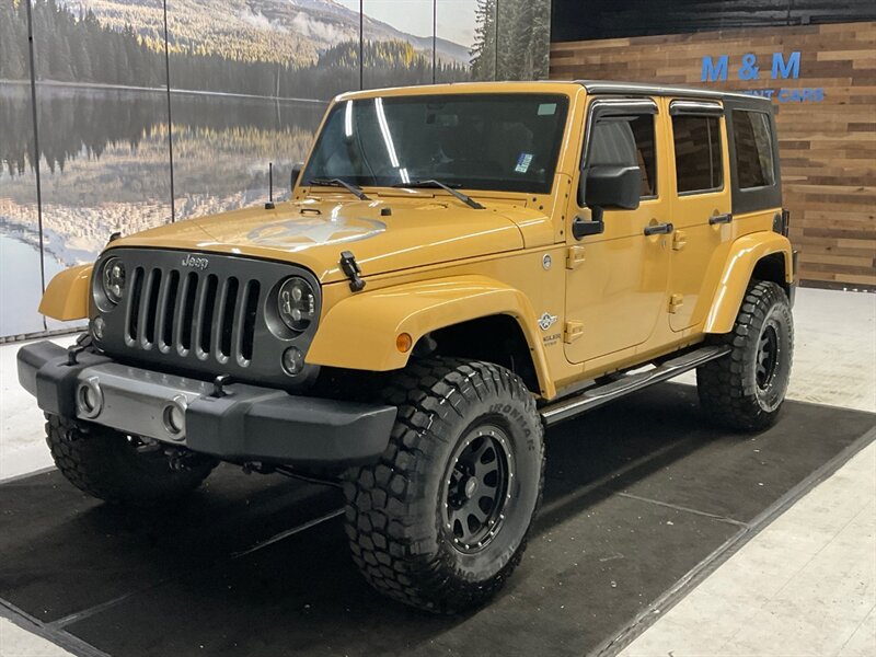 2014 Jeep Wrangler Unlimited Freedom Edition 4X4 / 3.6L V6 / LIFTED  / HARD TOP / LIFTED w. 35 " MUD TIRES & 16 " BLACK WHEELS - Photo 25 - Gladstone, OR 97027