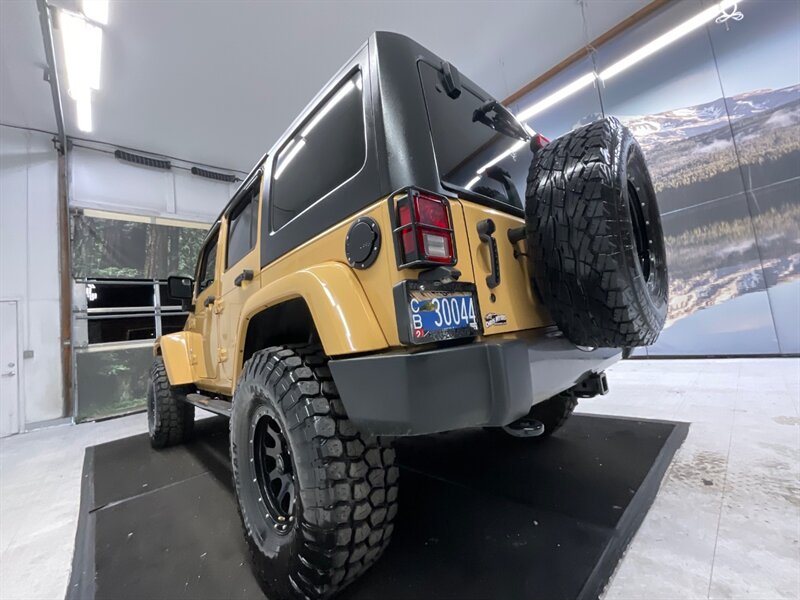 2014 Jeep Wrangler Unlimited Freedom Edition 4X4 / 3.6L V6 / LIFTED  / HARD TOP / LIFTED w. 35 " MUD TIRES & 16 " BLACK WHEELS - Photo 10 - Gladstone, OR 97027