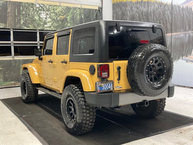 2014 Jeep Wrangler Unlimited Freedom Edition 4X4 / 3.6L V6 / LIFTED  / HARD TOP / LIFTED w. 35 " MUD TIRES & 16 " BLACK WHEELS - Photo 7 - Gladstone, OR 97027