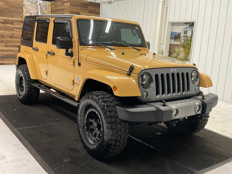 2014 Jeep Wrangler Unlimited Freedom Edition 4X4 / 3.6L V6 / LIFTED  / HARD TOP / LIFTED w. 35 " MUD TIRES & 16 " BLACK WHEELS - Photo 2 - Gladstone, OR 97027