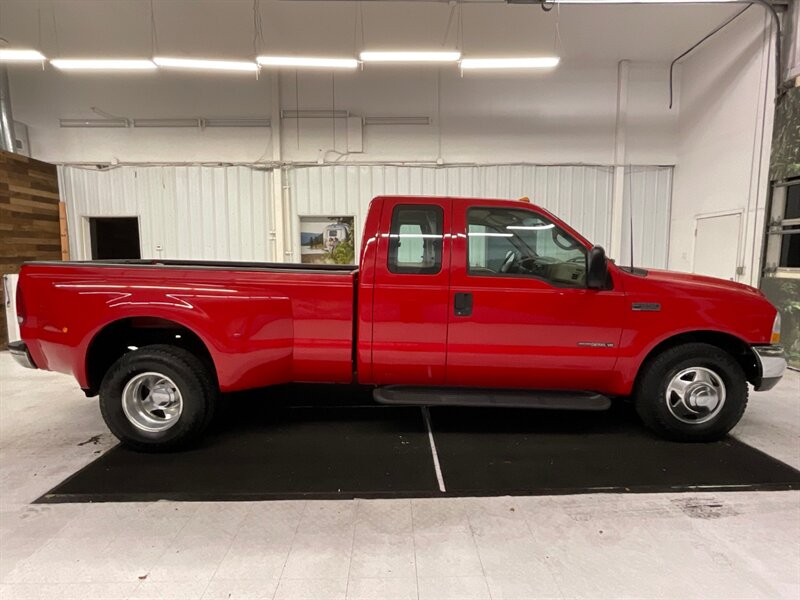 1999 Ford F-350 Lariat 2WD / 7.3L V8 DIESEL / 5-SPEED / DUALLY  / Leather Seats / RUST FREE / BRAND NEW TIRES / 5-SPEED MANUAL / DUALLY / LONG BED / 142,000 MILES - Photo 4 - Gladstone, OR 97027