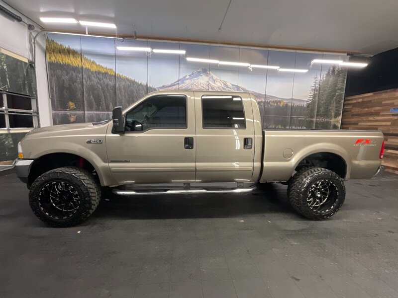 2003 Ford F-250 Lariat FX4 4X4 / 7.3L DIESEL /LIFTED / 94,000 MILE  LOCAL OREGON TRUCK / RUST FREE / LEATHER / LIFTED w/ 35 " MUD GRAPPLER & 20 " WHEELS / SHARP & CLEAN !! - Photo 3 - Gladstone, OR 97027