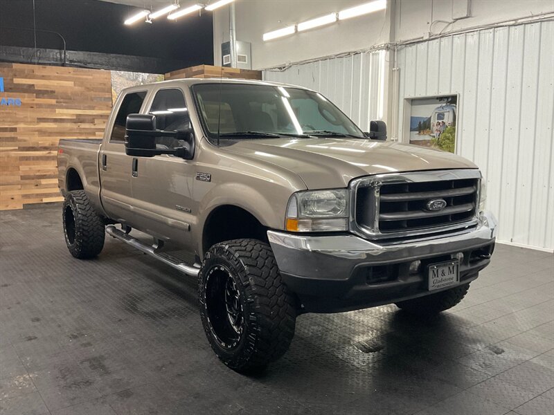 2003 Ford F-250 Lariat FX4 4X4 / 7.3L DIESEL /LIFTED / 94,000 MILE  LOCAL OREGON TRUCK / RUST FREE / LEATHER / LIFTED w/ 35 " MUD GRAPPLER & 20 " WHEELS / SHARP & CLEAN !! - Photo 2 - Gladstone, OR 97027