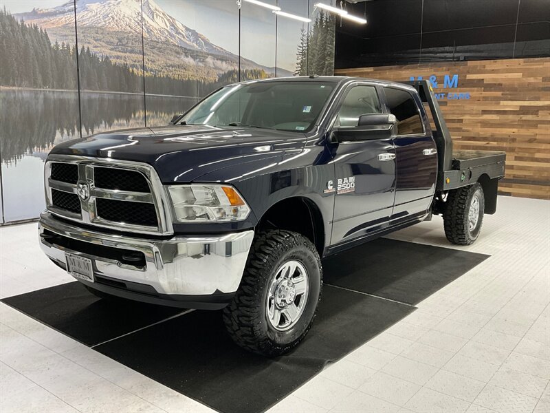 2015 RAM 2500 Crew Cab 4X4 / 6.7L DIESEL / 6-SPEED / FLAT BED  / LOCAL TRUCK / RUST FREE / LEVELED w/ BRAND NEW 35 " MUD TIRES / Backup Camera / LONG BED / SHARP & SUPER CLEAN !! - Photo 1 - Gladstone, OR 97027