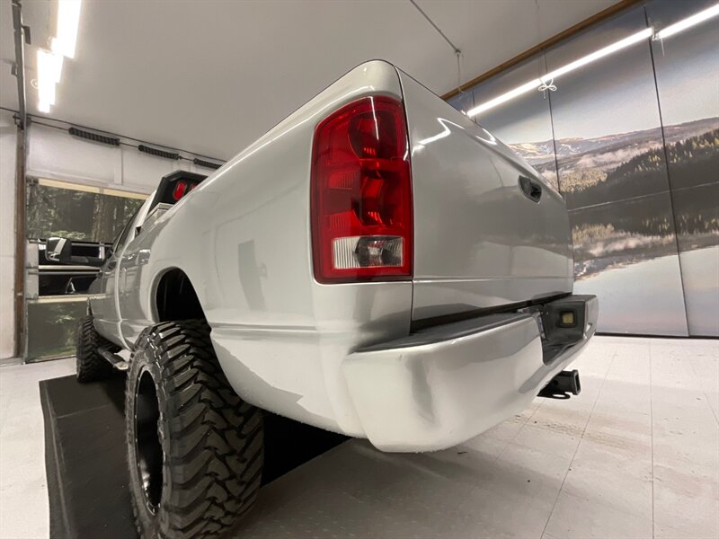 2004 Dodge Ram 2500 Laramie 4X4 / 5.9L DIESEL / 6-SPEED MANUAL  / LIFTED w. 35 " TOYO OPEN COUNTRY & 20 " MOTO WHEELS / Leather & Heated Seats / RUST FREE / LONG BED / SHARP & CLEAN / 137,000 MILES - Photo 11 - Gladstone, OR 97027