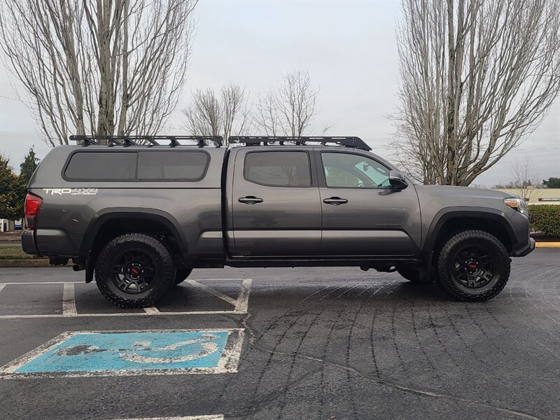 2019 Toyota Tacoma LONG BED 4X4 TRD OFF ROAD / MUD-CRAWL CONTROL  / DIFFERENTIAL LOCK / BSM / PRINSU RACK / SNUGTOP CANOPY / ALL TERRAIN TIRES / TRD WHEELS / FACTORY WARRANTY - Photo 4 - Portland, OR 97217