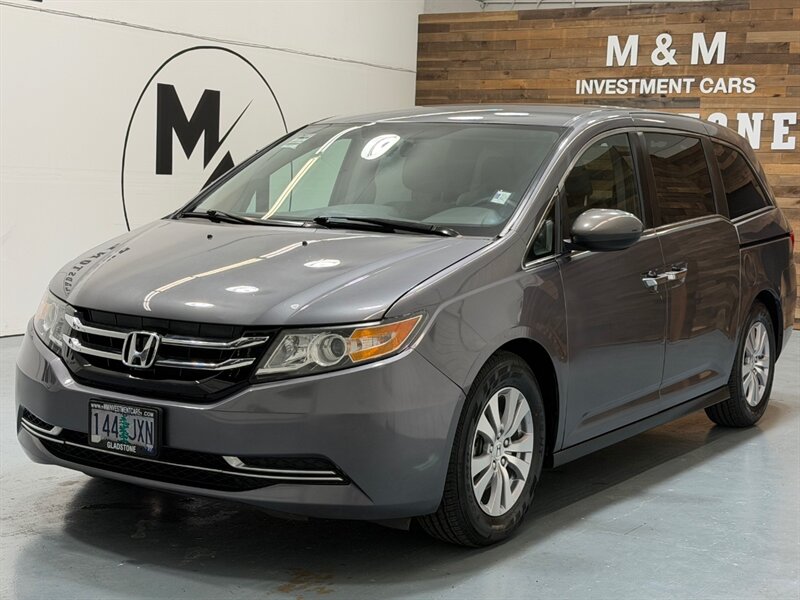 2016 Honda Odyssey SE Minivan 8-Passenger / NEW TIRES / ZERO RUST / DVD Player - Photo 1 - Gladstone, OR 97027